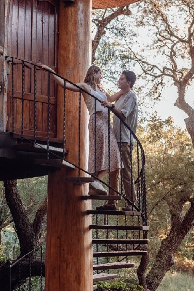 Couple on the hotel's spiral staircase
